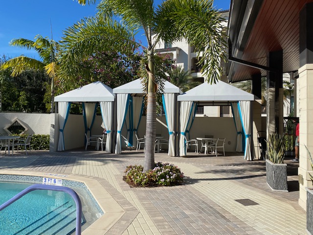 Shown here are draw drapes with custom banding these drapes can draw together allowing privacy between each cabana.